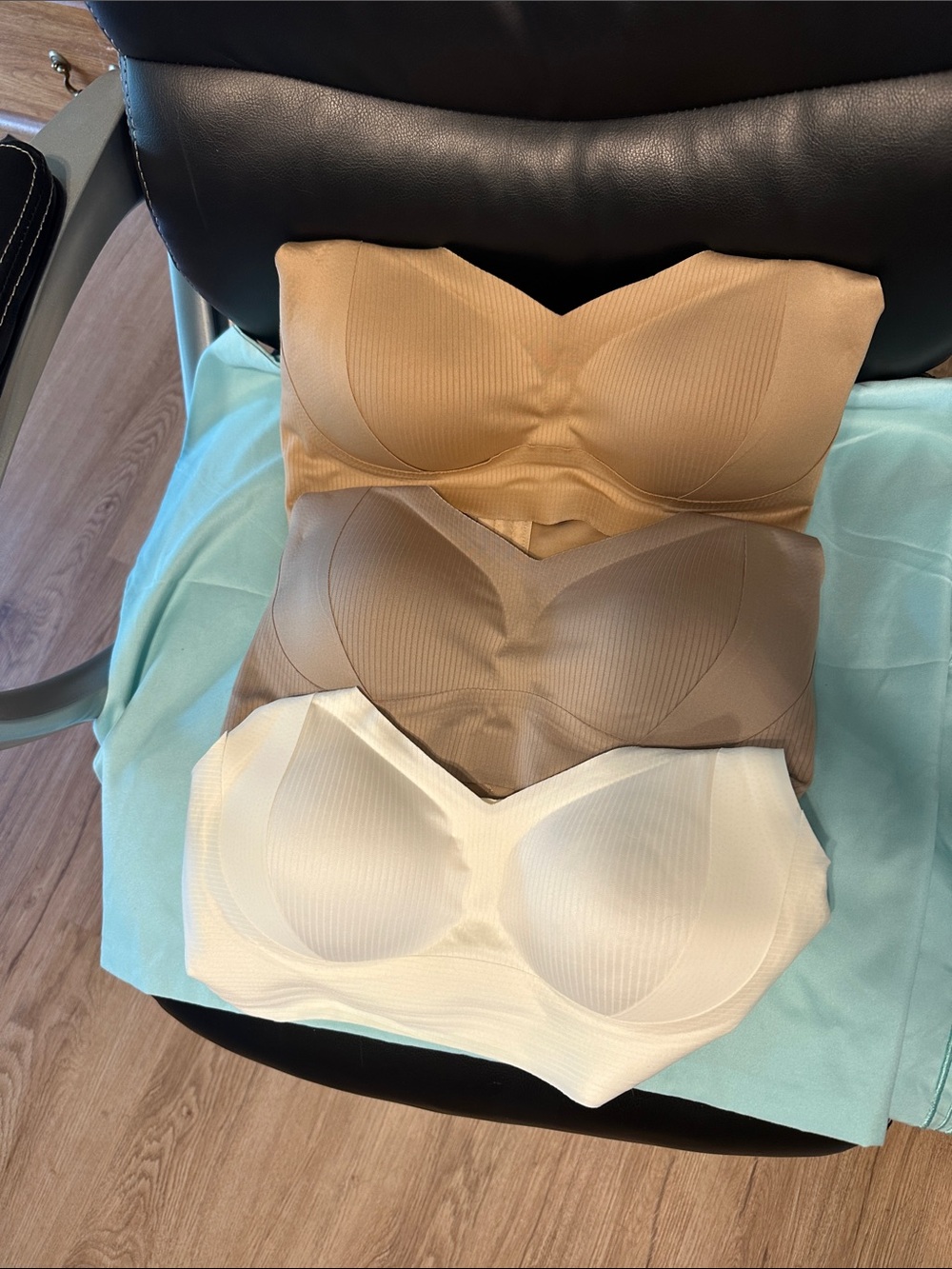 Women’s three bras. Brand new. Size medium.